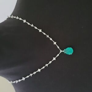 Pear cut faux Paraiba Necklace and earrings set in sterling silver.